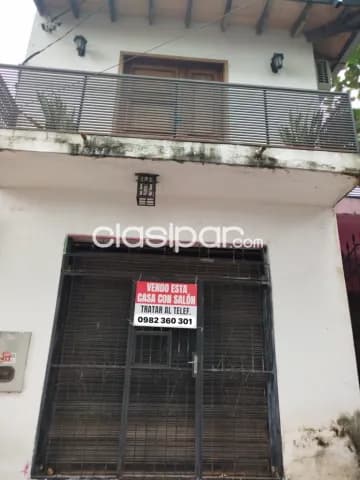 Casa con salon comercial sobre asfalto — foto 4