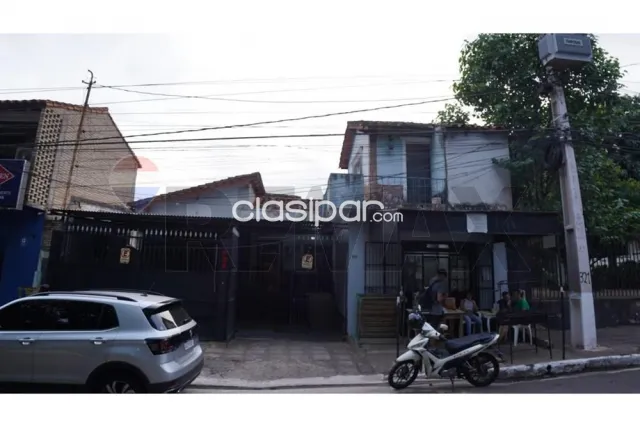 Terreno con casa en lambare sobre avenida, foto 3