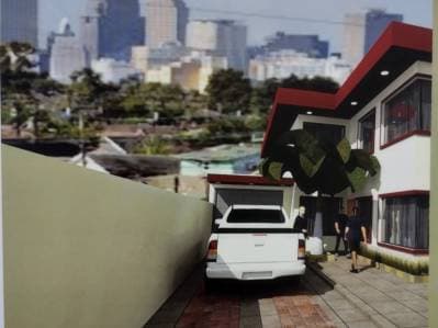 Lote en el Centro de Encarnación con deptos., salón y oficinas
