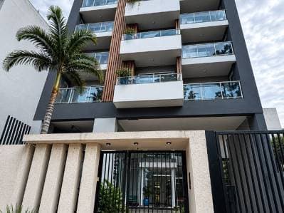 Vendo amplio depto. De 2 dorm. A estrenar con cochera en barrio Herrera