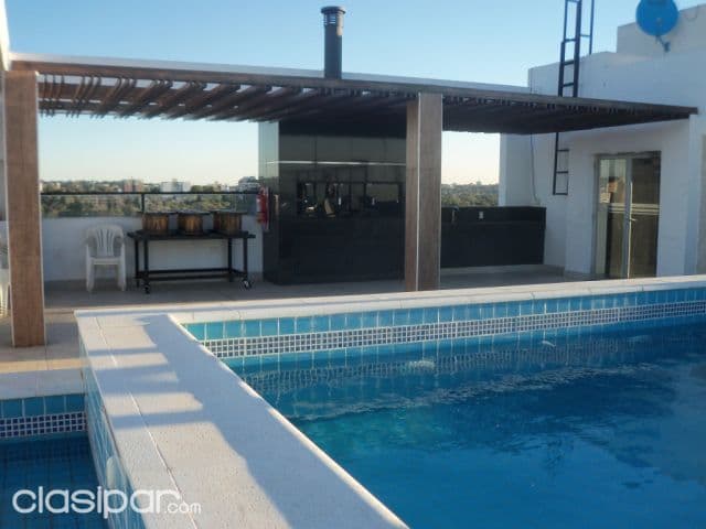 Villa Morra elegante departamento de 2 dormitorios en suite , piscina 2 cocheras