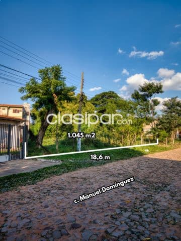 terreno con salida a dos calles en Lambaré