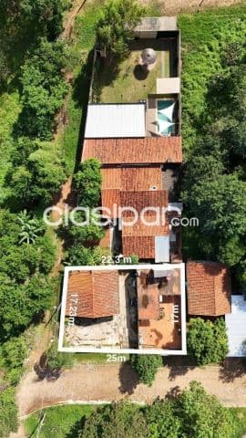 Terreno con Construcciones en esquina en el Barrio Yka’a- Luque